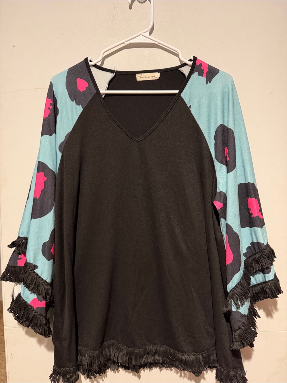 Black Top with Aqua & Hot Pink Animal-Print Bell Sleeves